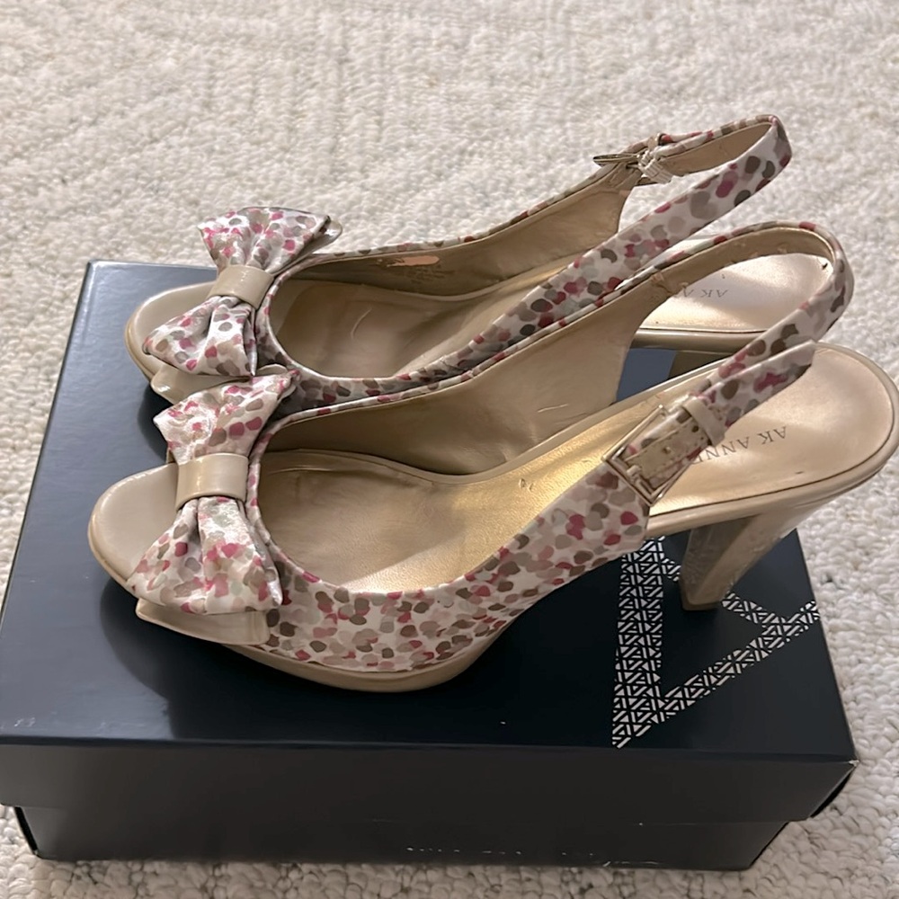 Anne Klein Bow tie peep toe heels.